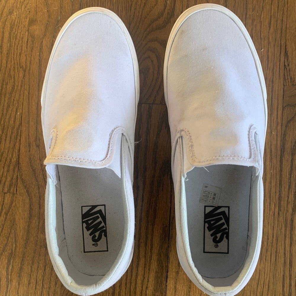 White Slip on Vans Mens 9 Womens 10.5. Not new have been worn once